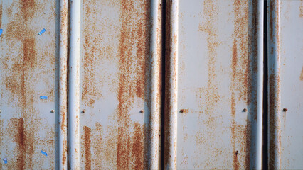 Textured Rusted Iron Sheet on Weathered Shipping Container