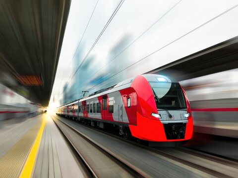 Modern train in motion and blur, Russian Railways trains of Moscow and MCC. Moscow Central Circle, metro, underground Red beautiful train in motion. No people blurred train station High quality photo