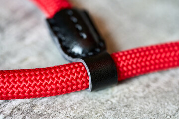 Red braided rope, black detail