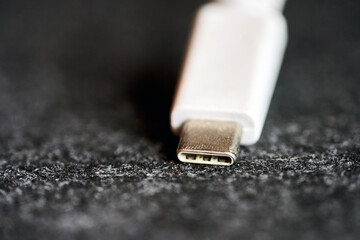 Close view of a white USB-C connector