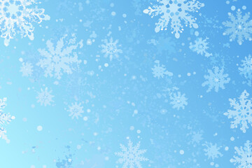 A serene winter background featuring delicate white snowflakes on a blue canvas