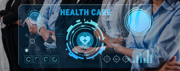 Professionals in business attire collaborate with advanced health care technology, showcasing innovative data visualization and medical solutions in a modern work environment. Trope