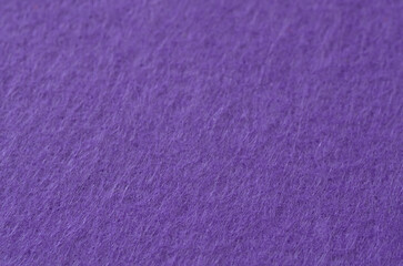 Vibrant Purple Felt Texture Macro: Dense, Soft Non-Woven Fabric Background.
