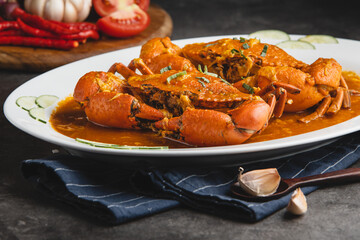 Delicious Chili Crabs Served on a White Plate.