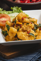 Delicious Fried Chicken with Curry Leaves and Chili.