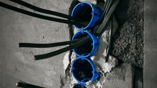 Preliminary Electrical Feed Preparation Involving Multiple Outlet Boxes And Exposed Cables