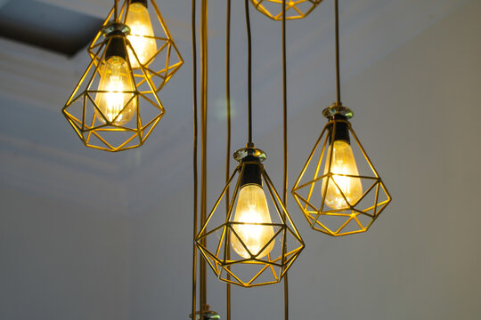 Modern Geometric Pendant Lights with Edison Bulbs Glowing Warmly