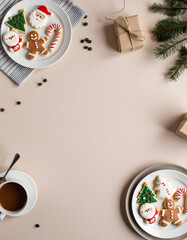 Festive Christmas cookies and coffee with gifts and pine branches