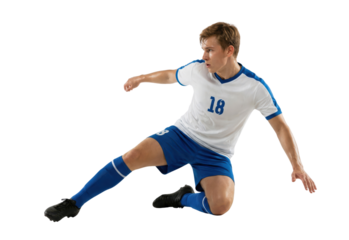 Soccer player in blue uniform sliding tackle isolated on white background