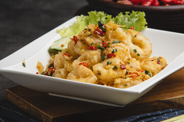 Delicious Salted Egg Prawns with Chili and Herbs.