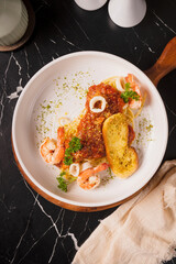 Delicious Seafood Pasta with Shrimp and Garlic Bread.