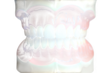 A stylized view of a full set of dentures with bright white teeth and pink gums against a white background