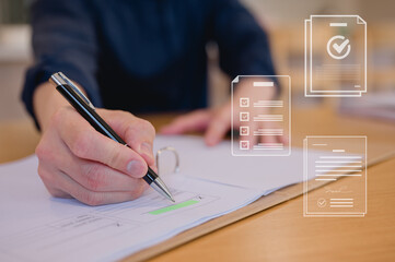 Closeup hand photo of Business professional carefully signing important documents using pen sitting...
