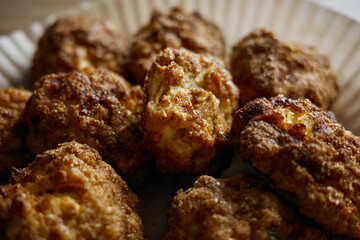 cottage cheese cookies with apples and cinnamon on a paper plate in a kitchen after cooking for a meal at lunchtime