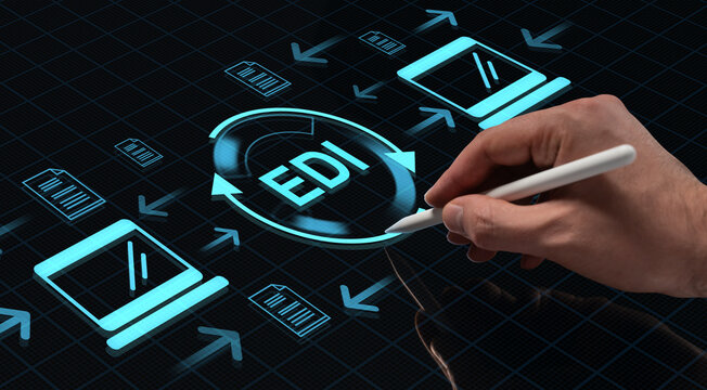 Hand using stylus to interact with EDI digital interface concept on futuristic HUD screen for business data exchange and technology communication idea.