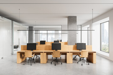 Modern office interior with light wood desks and computers in open workspace with city view and minimalist design elements. 3D Rendering