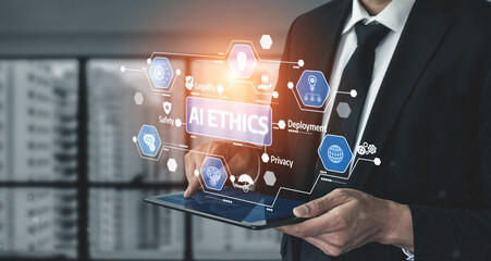 A businessman in a suit interacts with a tablet displaying concepts of artificial intelligence ethics, highlighting privacy and safety in a modern business environment. Tessel