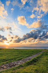 秋の入道崎から見た夕日　秋田県男鹿市　Autumn sunset seen from Nyudozaki. Akita Pref, Oga City.