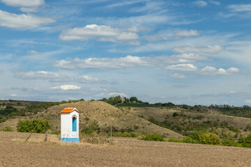Wayside shrine standing amidst fields in Vrbovec Czechia