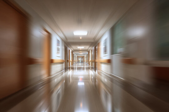 Blurred hospital hallway.
