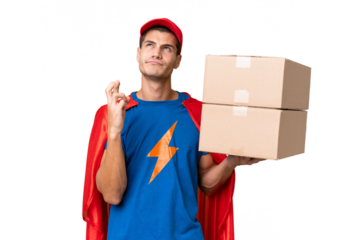 Super Hero delivery man over isolated background with fingers crossing and wishing the best