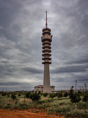 Obraz premium Telephone and television tower with cloudy skies. Catarroja (Valencia - Spain)