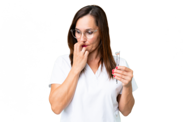 Dentist caucasian woman over isolated chroma key background having doubts