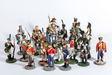 Obraz premium Group of toy soldiers on a plain white