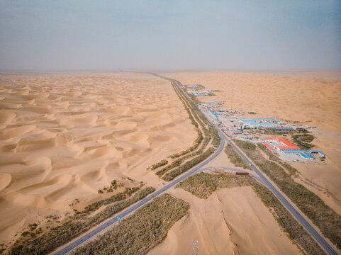 Aerial view of a small oil town in the heart of the Taklamakan Desert in Xinjiang, China.