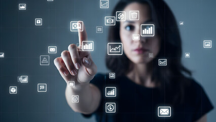 Woman interacting with virtual business interface icons