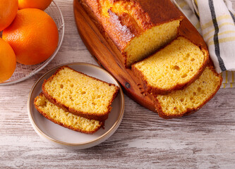 orange cake, sliced and served