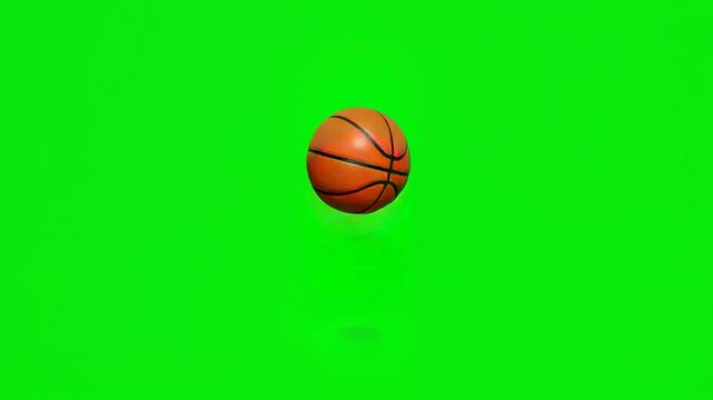  bouncing basketball, loopable, isolated on green screen background for vfx projects video