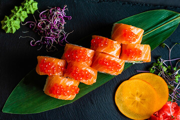 Gourmet Salmon Maki with Microgreens and Persimmon © Aliaksandr