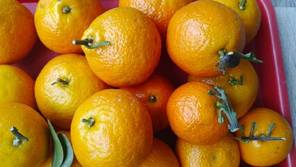 Close Up of Fresh Bright Orange Tangerines.