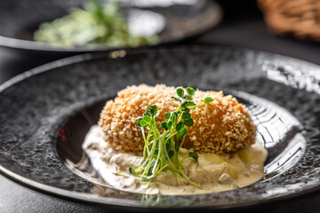 Classic chicken kiev cutlet with creamy sauce