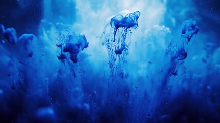 Vibrant blue ink dispersing in clear water creating abstract ethereal formations