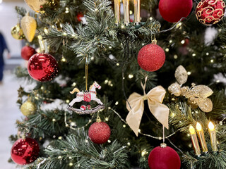 Festive Christmas Tree Ornaments Glowing Candles, Red And Gold Baubles, Glass Star, Nutcracker Figurine, Delicate Tinsel And Garland, Warm Bokeh Lights And Candlelight, Lush Pine Branches