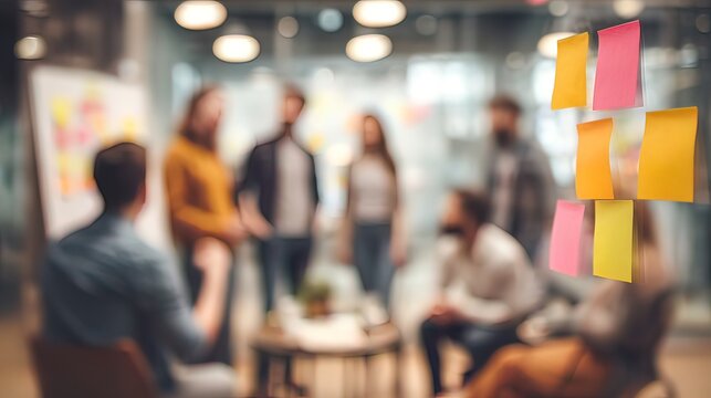 Team Strategy Session Blur - Blurred background of a brainstorming session among team members. High quality. High quality - Powered by Adobe