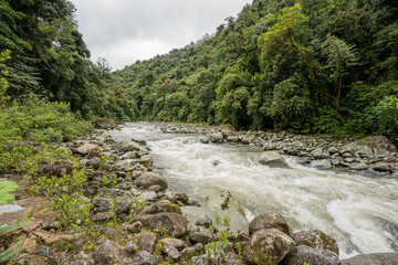 Provincia de Cartago, San Rafael, Costa Rica - 26 June 2022: rocky banks of the Orosi River in Tapant&iacute; National Park