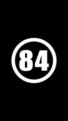 White oval with number 84 on black background white text large number