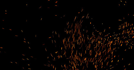 Realistic fire sparks flying through the air, isolated on a black background. Perfect as a cinematic VFX overlay, fire particles effect or visual element.