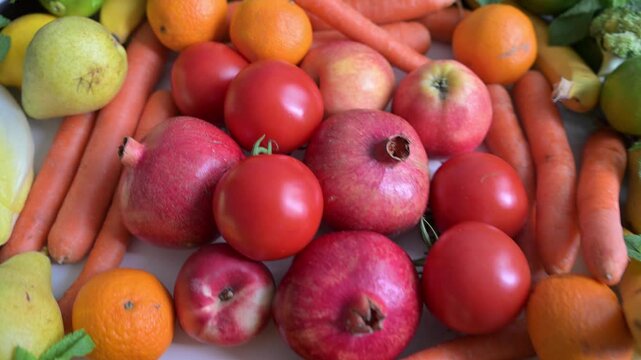 Vibrant flat lay captured in real-time. Emphasizes the variety and freshness of the produce. Perfect for nutritionists and healthy eating campaigns.