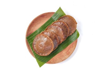 Cucur cake on wooden plate on white background with flat lay view. Indonesian traditional cake made from rice flour and palm sugar