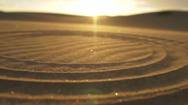 Desert sand texture with circular pattern and sunset sunlight