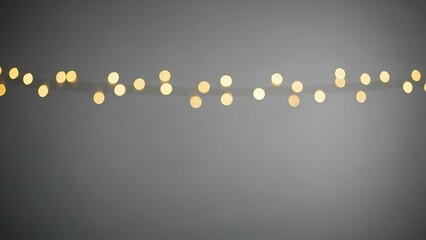 Soft bokeh of warm fairy lights strung against a dark background