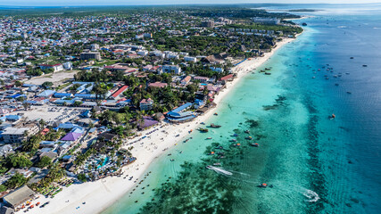 aerial landscape view along Nungwi beach in southerly direction, located in northwest part of Nungwi village in the far northern end of island of Zanzibar 