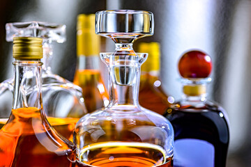 Bottles and carafes of assorted alcoholic beverages