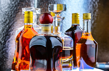 Bottles and carafes of assorted alcoholic beverages