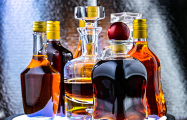 Bottles and carafes of assorted alcoholic beverages