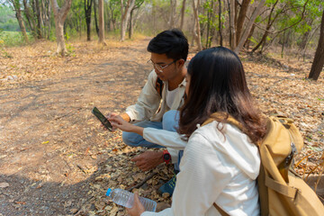 A couple who enjoy hiking and adventure.